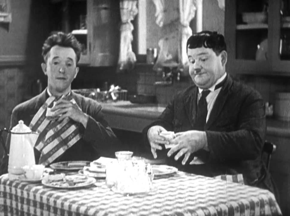 laurel-and-hardy-eating-in-one-good-turn.jpg